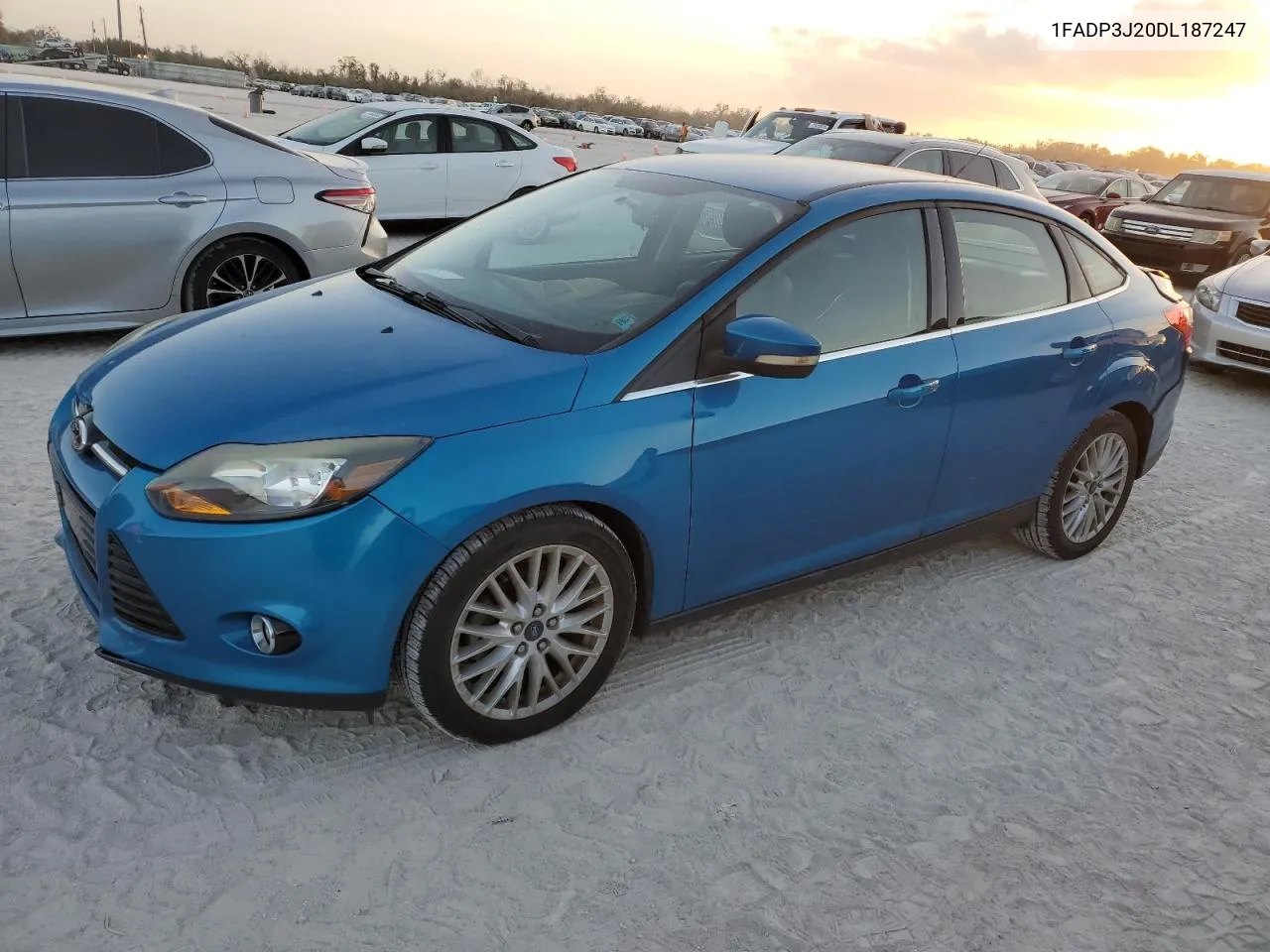 2013 Ford Focus Titanium VIN: 1FADP3J20DL187247 Lot: 77479344