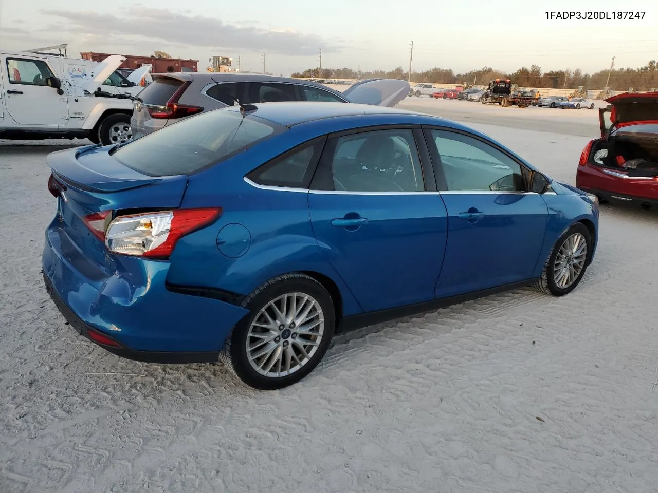 2013 Ford Focus Titanium VIN: 1FADP3J20DL187247 Lot: 77479344