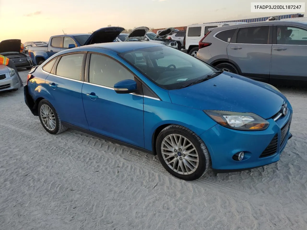 2013 Ford Focus Titanium VIN: 1FADP3J20DL187247 Lot: 77479344