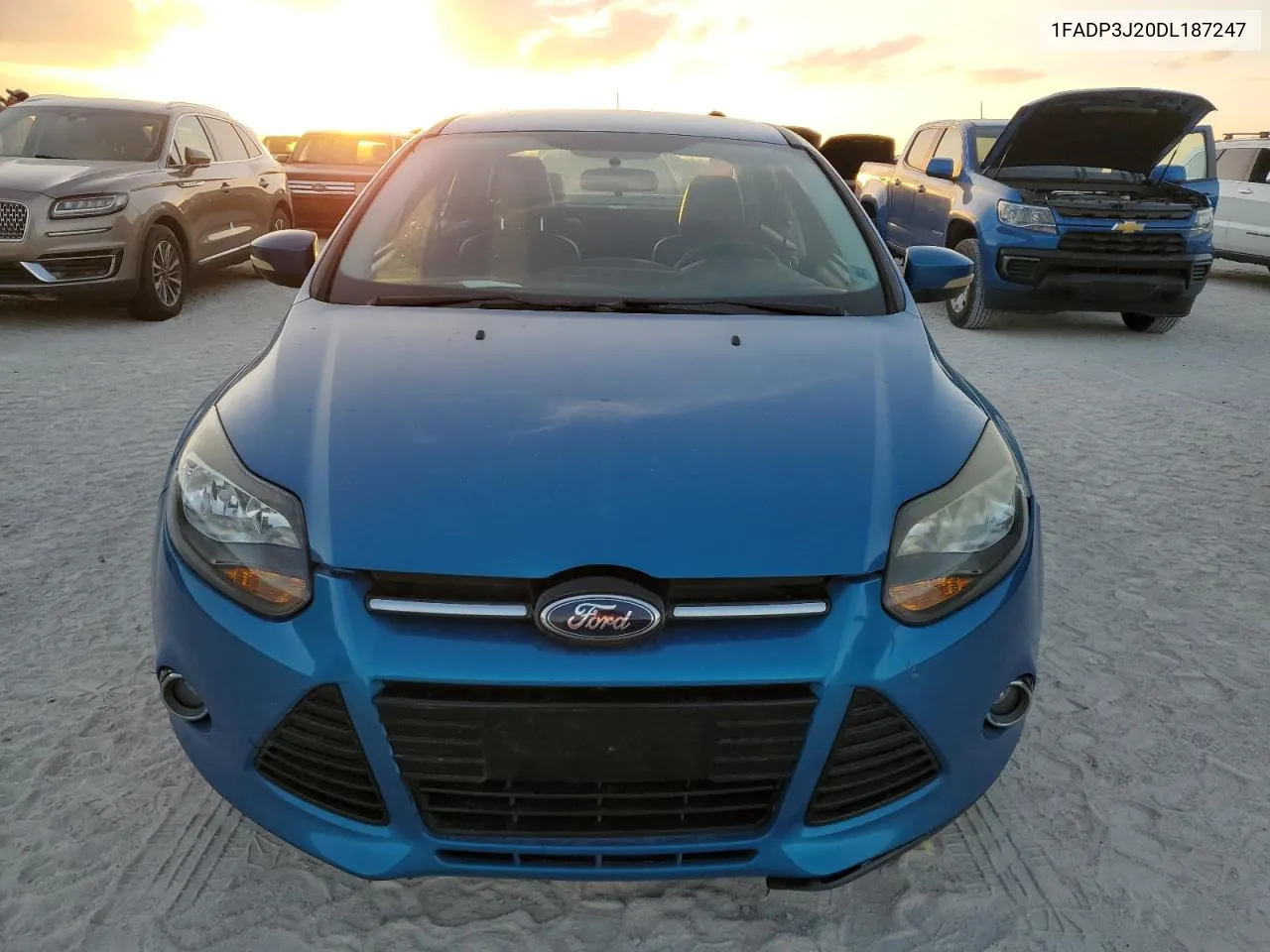 2013 Ford Focus Titanium VIN: 1FADP3J20DL187247 Lot: 77479344