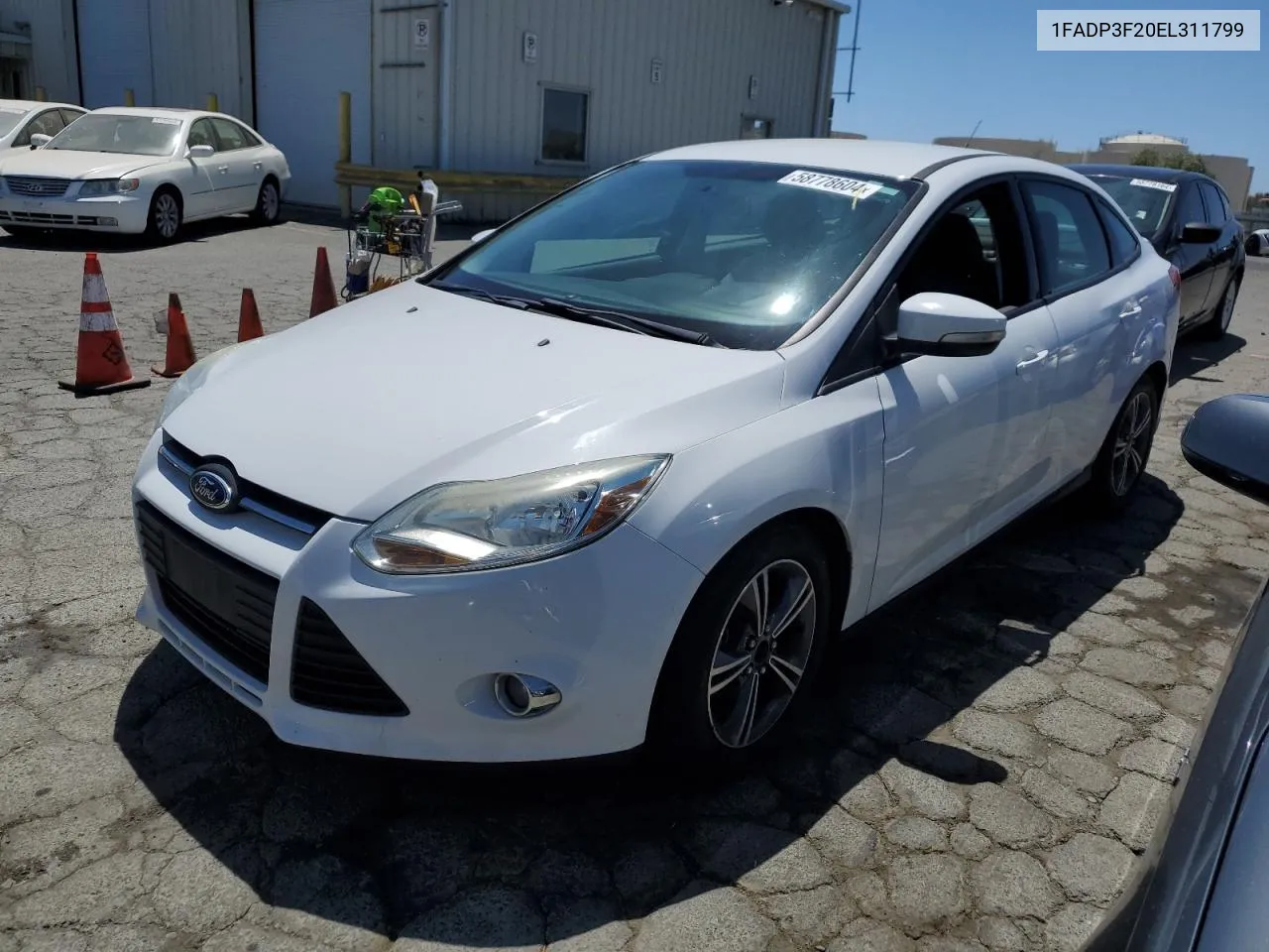 2014 Ford Focus Se VIN: 1FADP3F20EL311799 Lot: 58778604