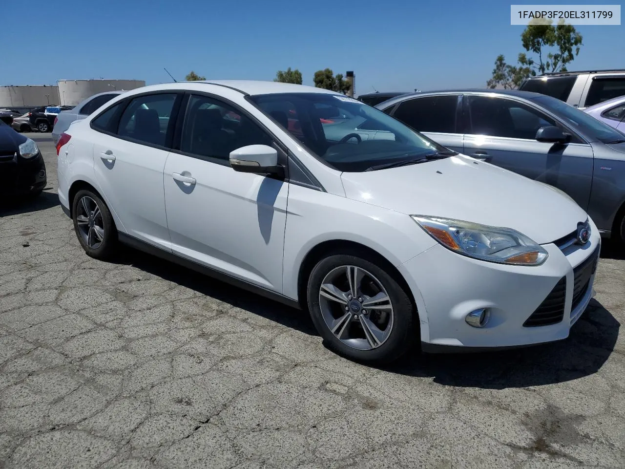 2014 Ford Focus Se VIN: 1FADP3F20EL311799 Lot: 58778604