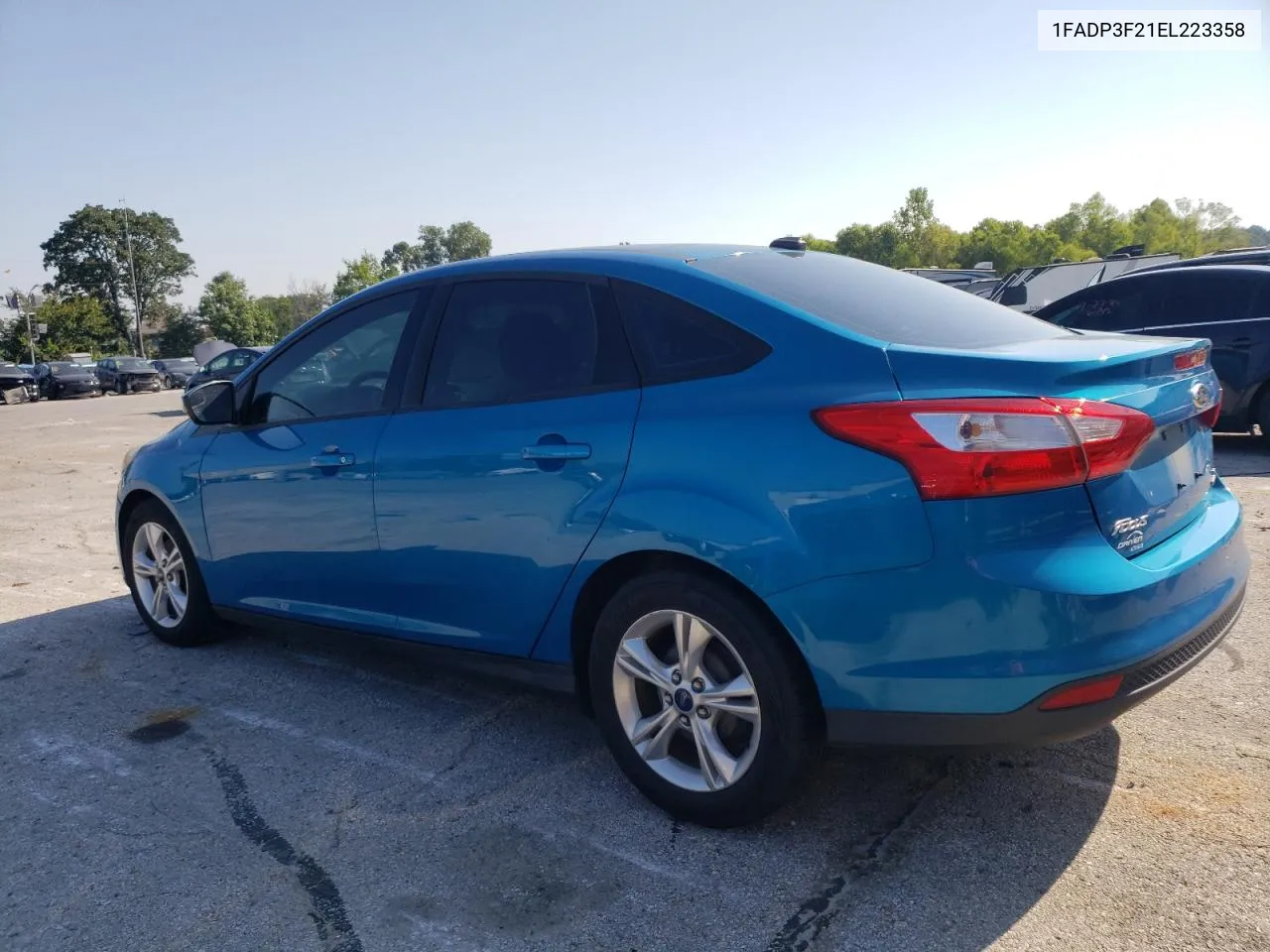 2014 Ford Focus Se VIN: 1FADP3F21EL223358 Lot: 61721364