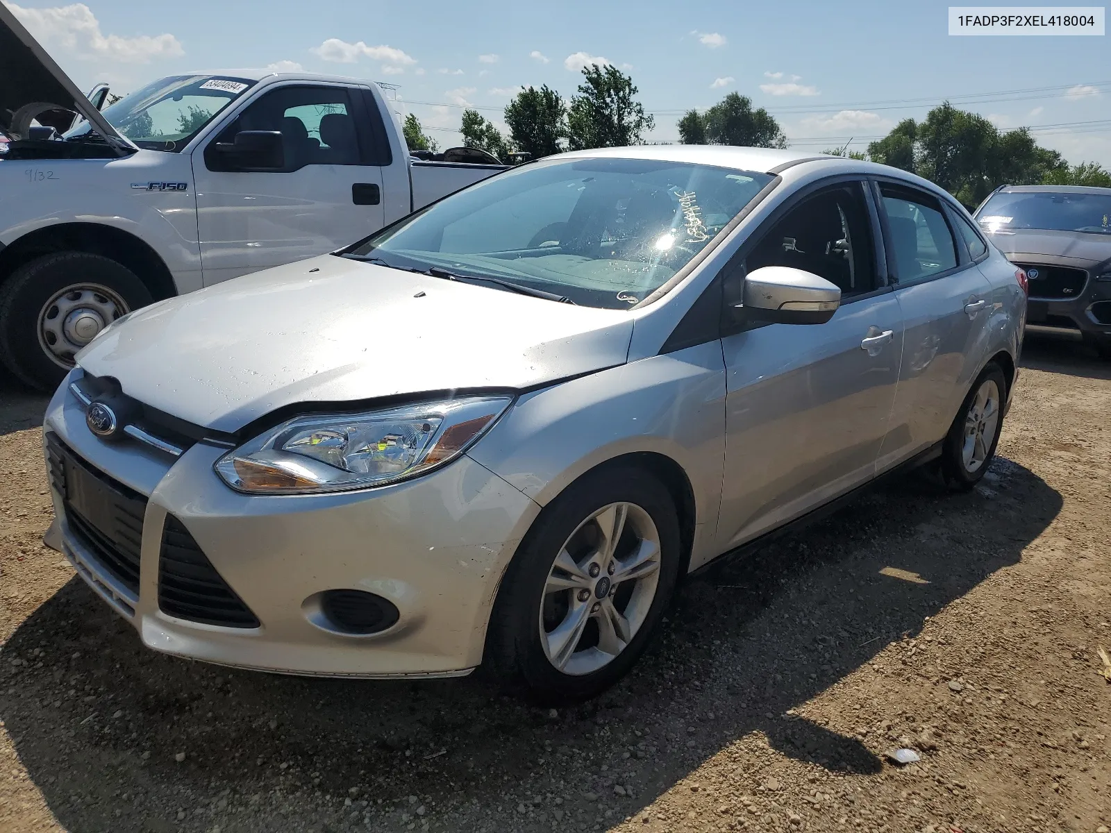 2014 Ford Focus Se VIN: 1FADP3F2XEL418004 Lot: 63644194