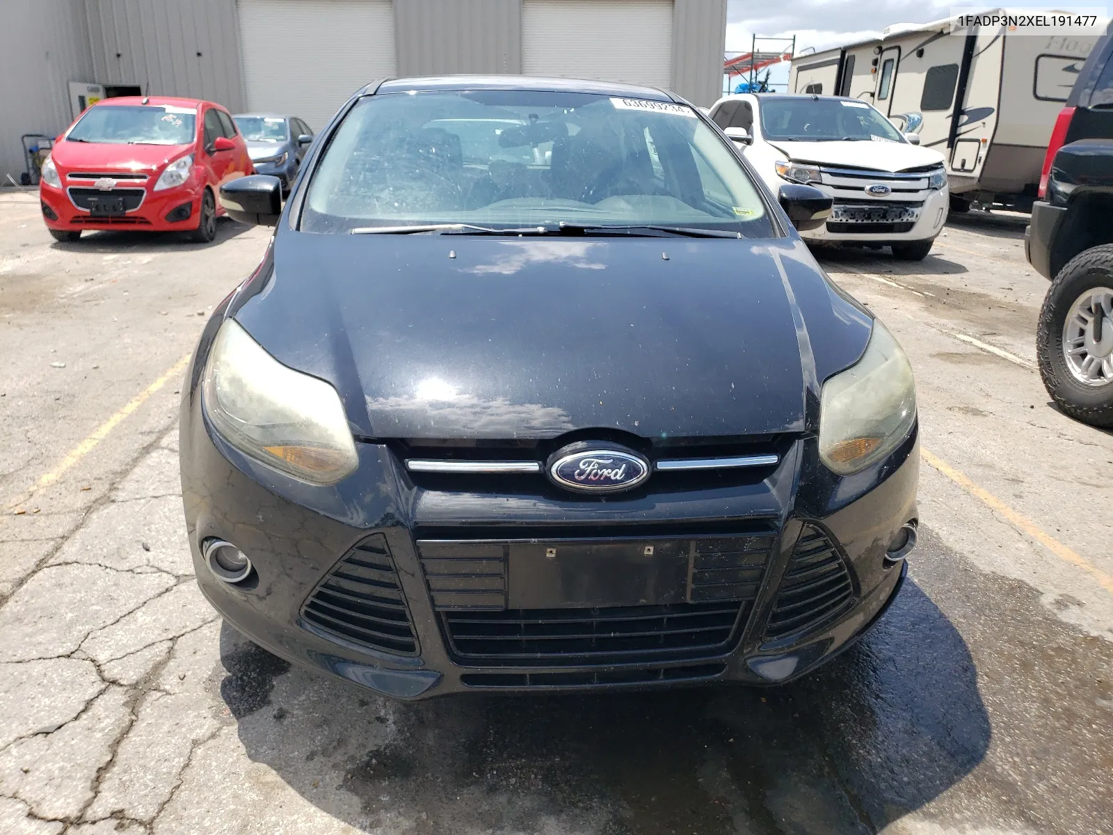 2014 Ford Focus Titanium VIN: 1FADP3N2XEL191477 Lot: 63699234