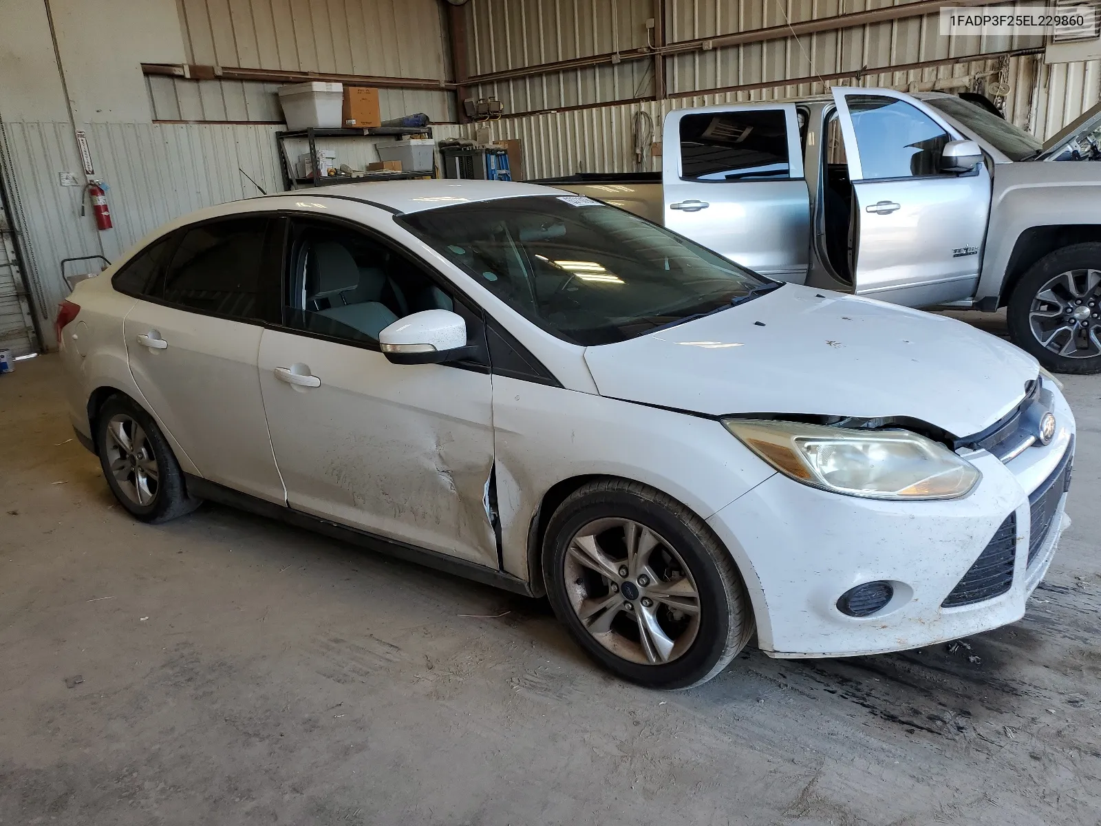 2014 Ford Focus Se VIN: 1FADP3F25EL229860 Lot: 63710154