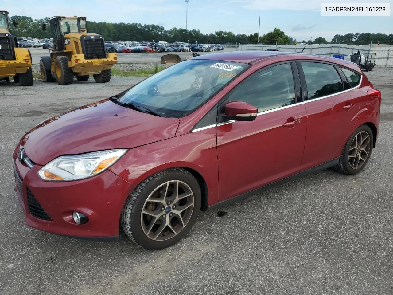 2014 Ford Focus Titanium VIN: 1FADP3N24EL161228 Lot: 64001664