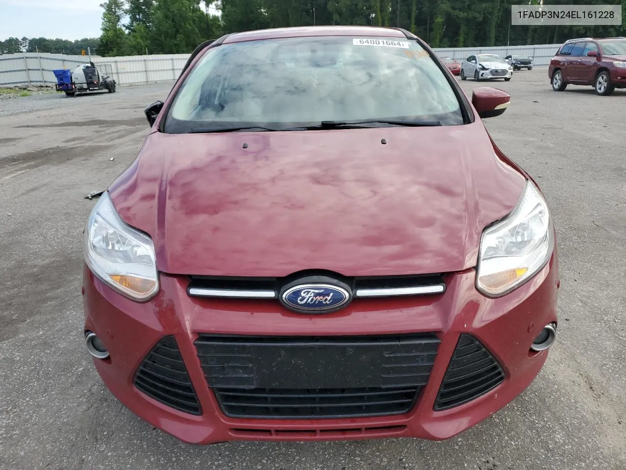 2014 Ford Focus Titanium VIN: 1FADP3N24EL161228 Lot: 64001664