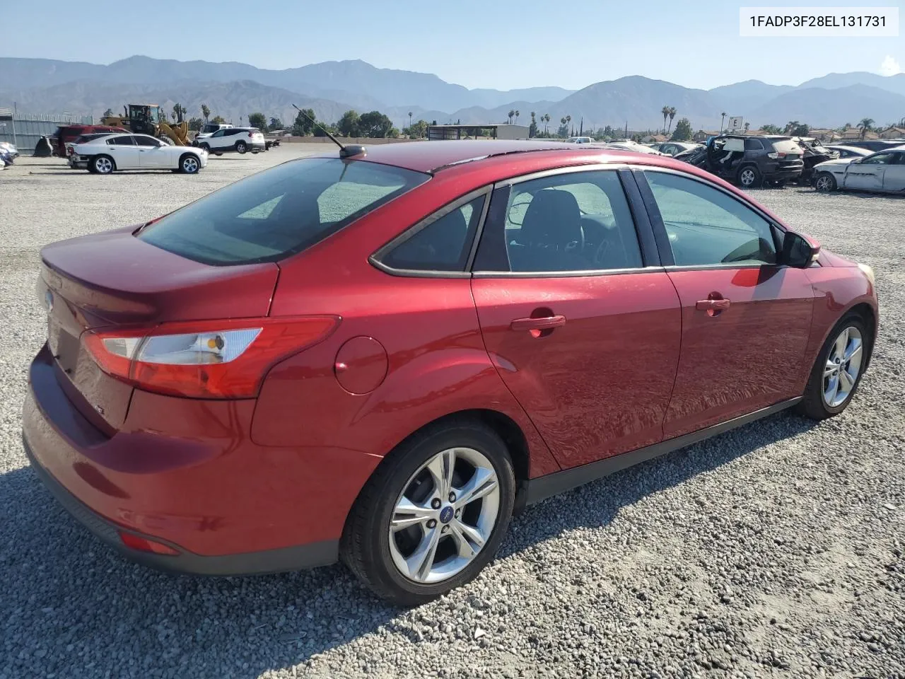 2014 Ford Focus Se VIN: 1FADP3F28EL131731 Lot: 64103534