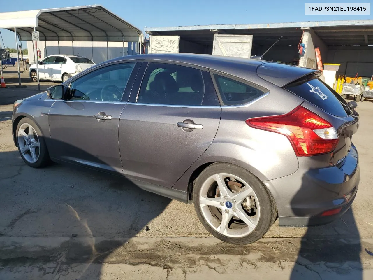 2014 Ford Focus Titanium VIN: 1FADP3N21EL198415 Lot: 66422974