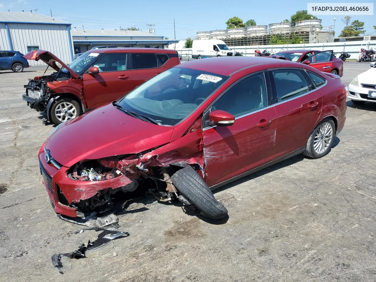 2014 Ford Focus Titanium VIN: 1FADP3J20EL460656 Lot: 67042374