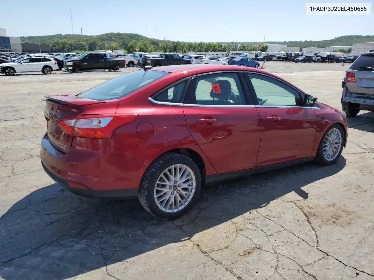 2014 Ford Focus Titanium VIN: 1FADP3J20EL460656 Lot: 67042374