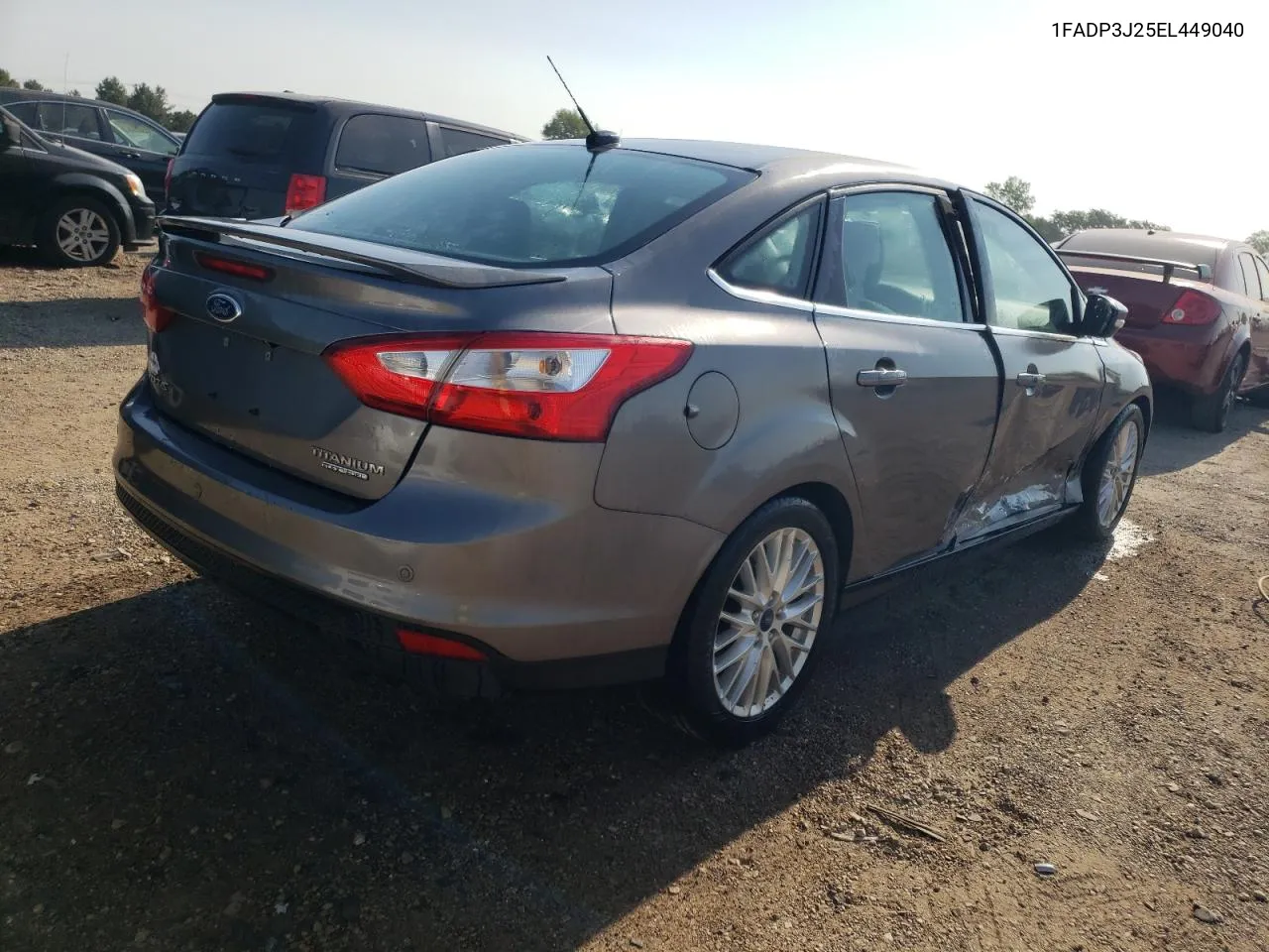 2014 Ford Focus Titanium VIN: 1FADP3J25EL449040 Lot: 67124194