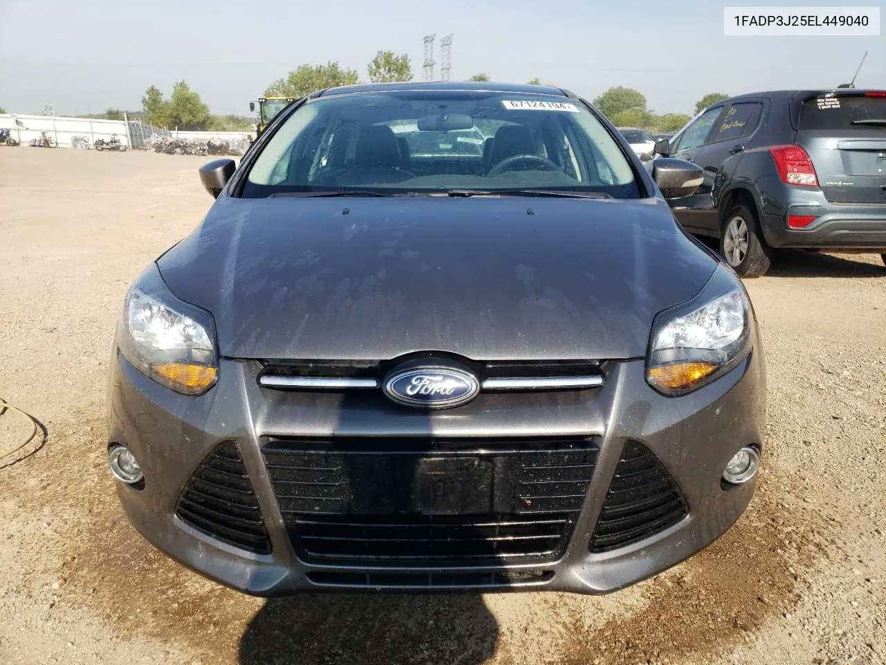 2014 Ford Focus Titanium VIN: 1FADP3J25EL449040 Lot: 67124194