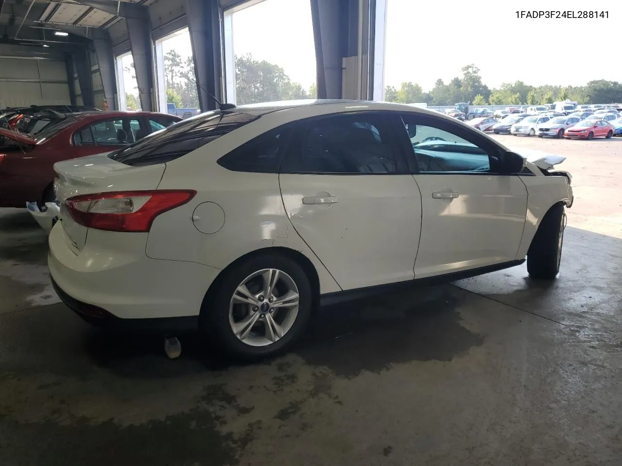 2014 Ford Focus Se VIN: 1FADP3F24EL288141 Lot: 68475394