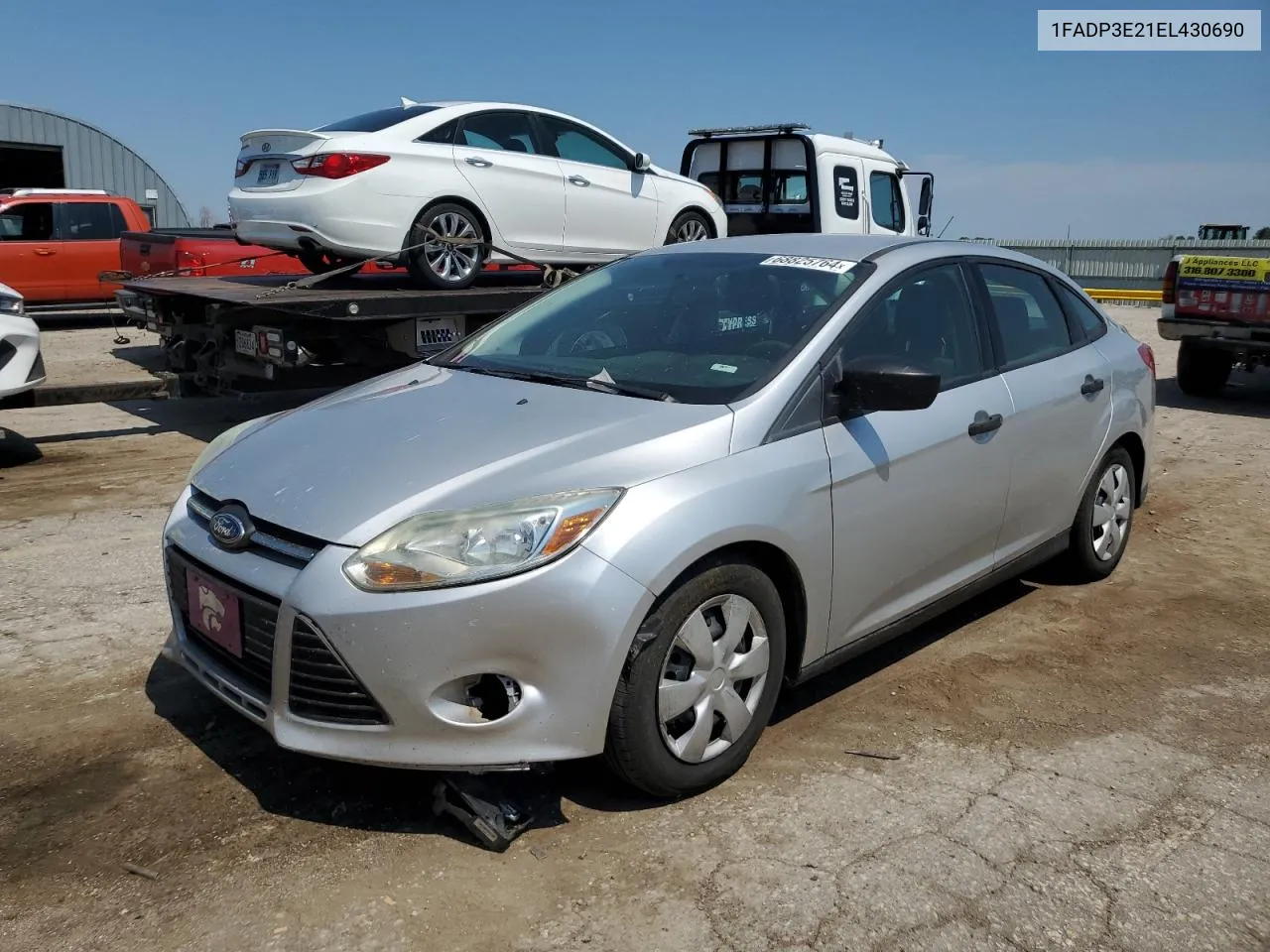 2014 Ford Focus S VIN: 1FADP3E21EL430690 Lot: 68825764