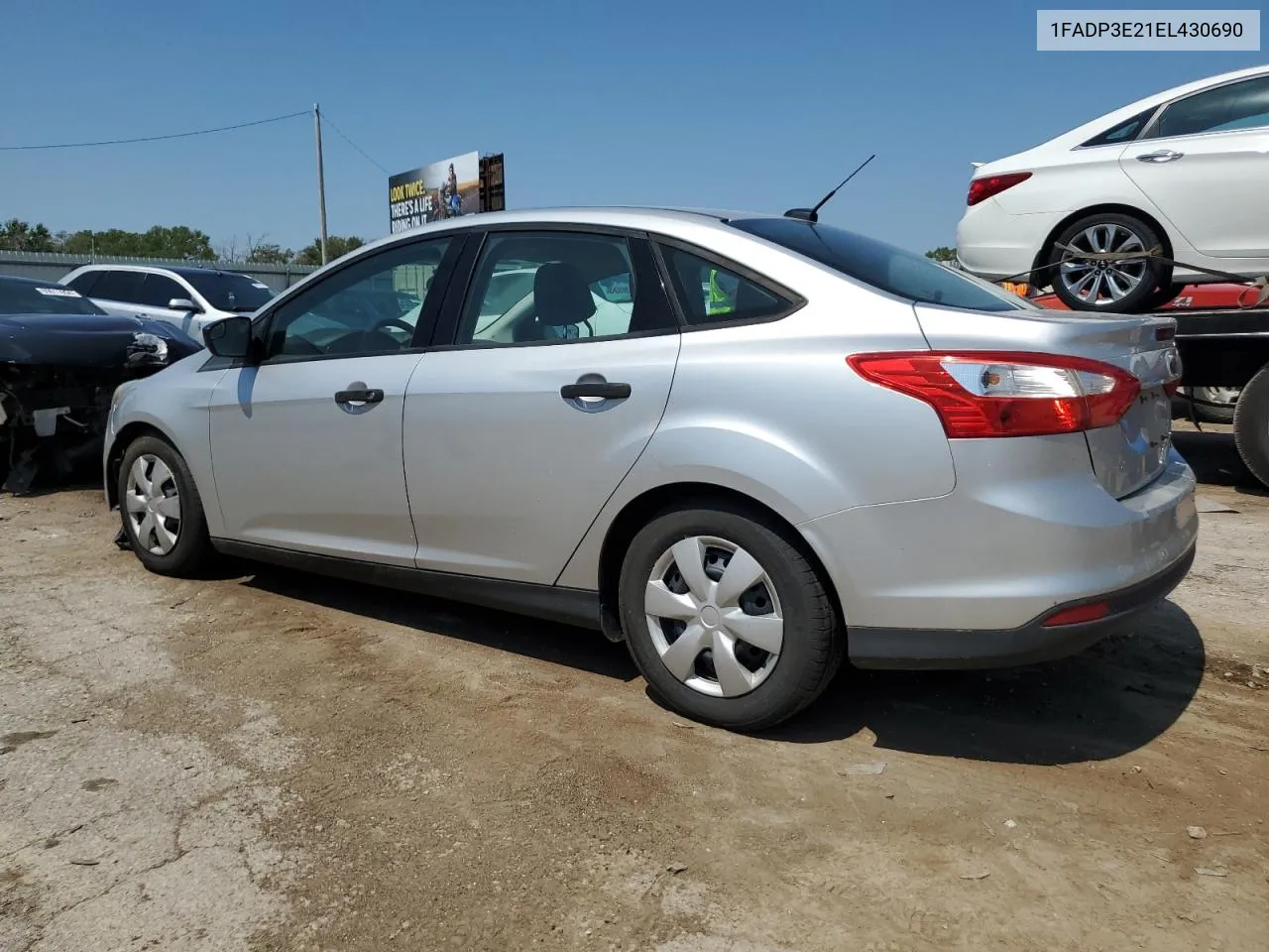 2014 Ford Focus S VIN: 1FADP3E21EL430690 Lot: 68825764