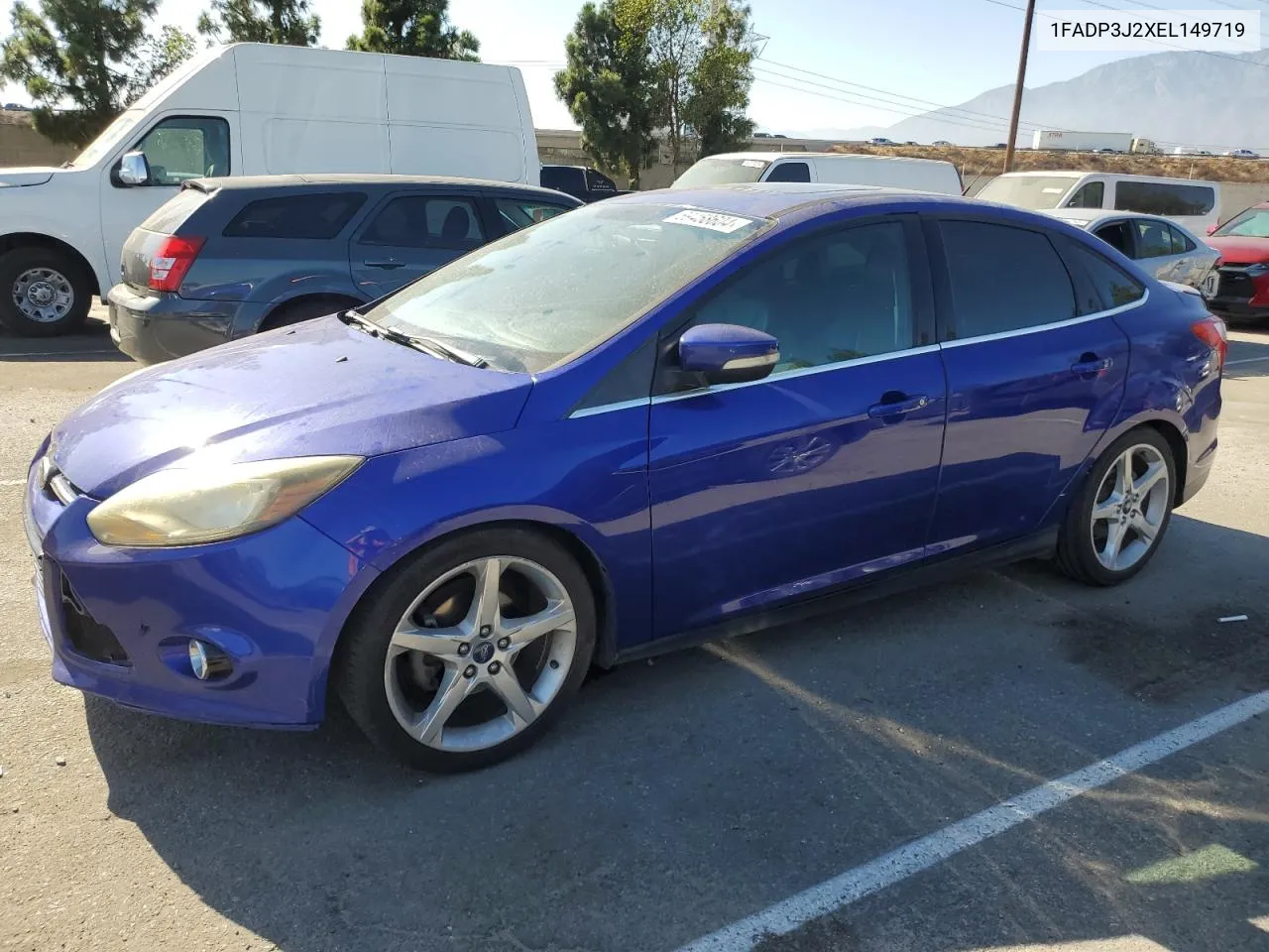 2014 Ford Focus Titanium VIN: 1FADP3J2XEL149719 Lot: 69458604