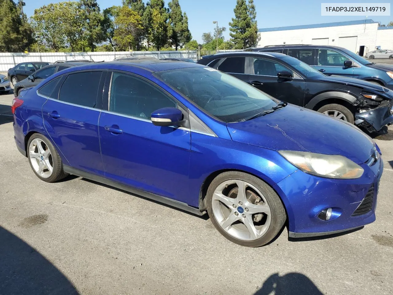 2014 Ford Focus Titanium VIN: 1FADP3J2XEL149719 Lot: 69458604