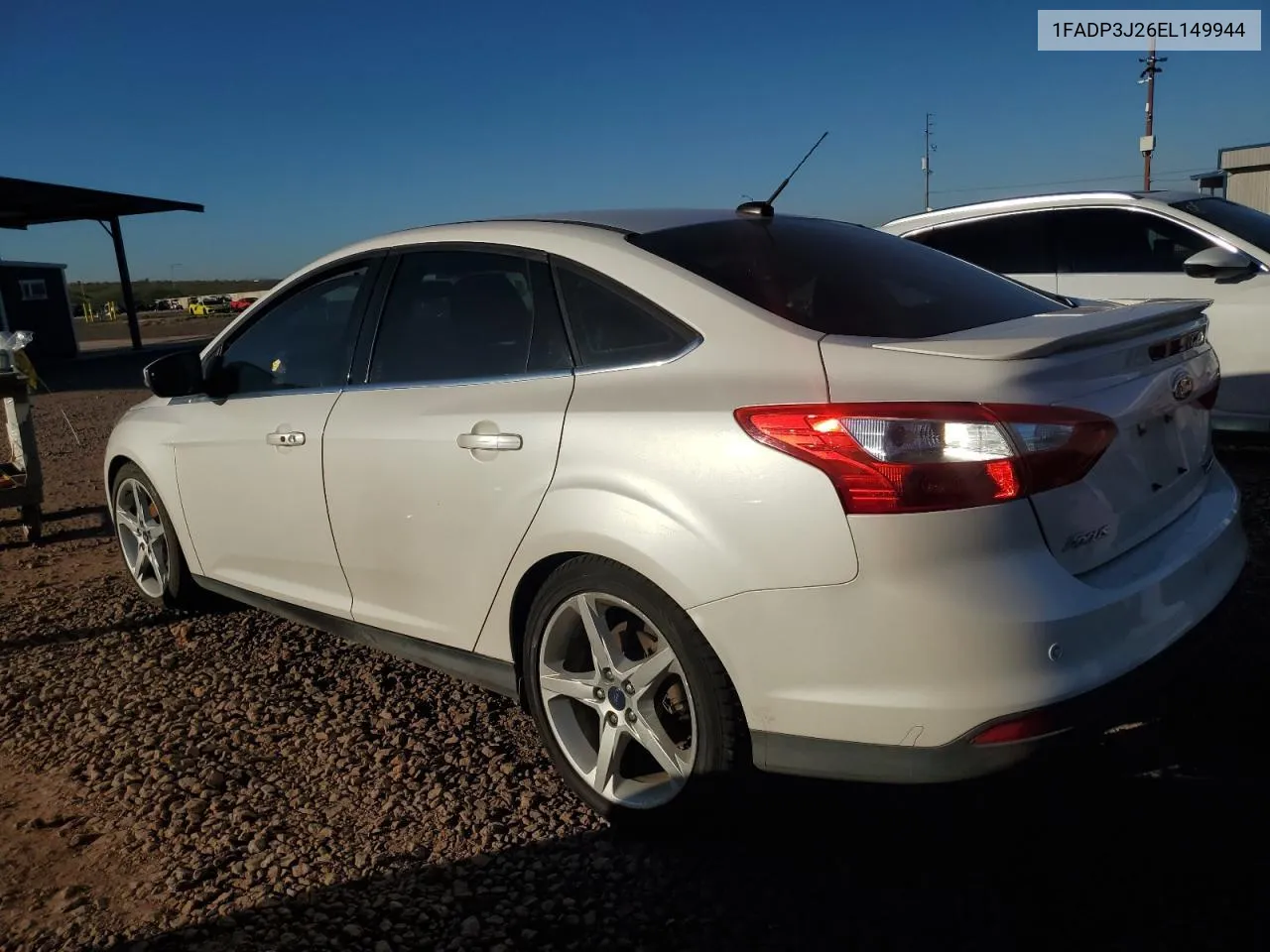 2014 Ford Focus Titanium VIN: 1FADP3J26EL149944 Lot: 70642554