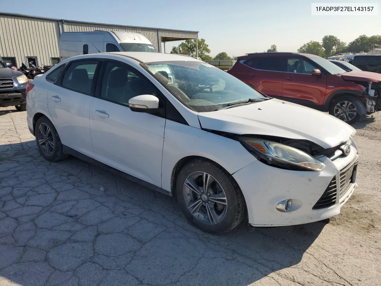 2014 Ford Focus Se VIN: 1FADP3F27EL143157 Lot: 70715524