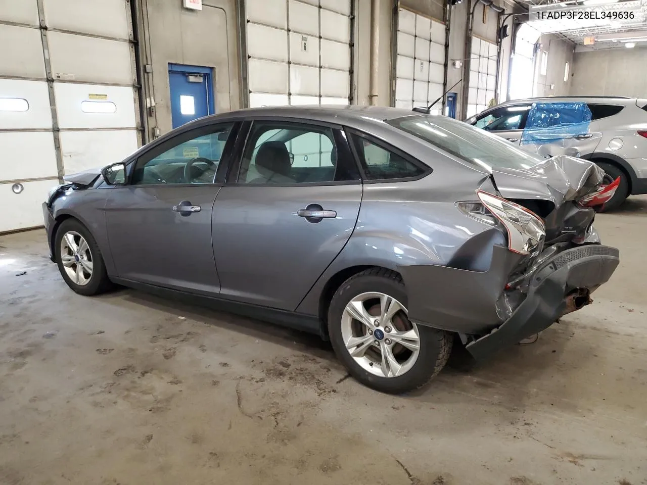 2014 Ford Focus Se VIN: 1FADP3F28EL349636 Lot: 70800854