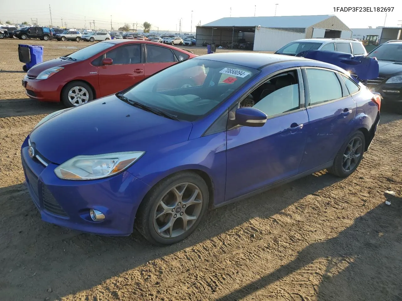 2014 Ford Focus Se VIN: 1FADP3F23EL182697 Lot: 70858094