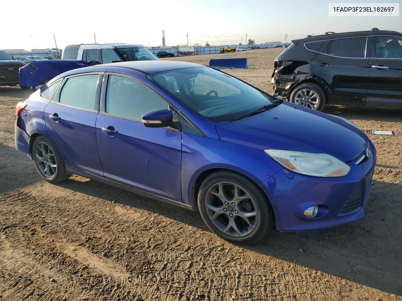 2014 Ford Focus Se VIN: 1FADP3F23EL182697 Lot: 70858094