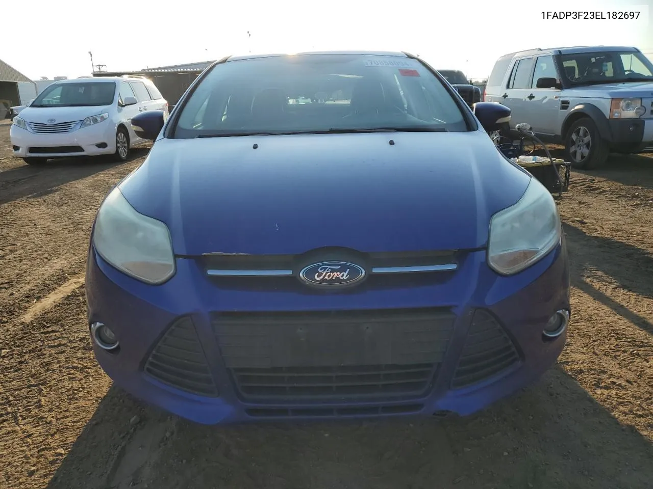 2014 Ford Focus Se VIN: 1FADP3F23EL182697 Lot: 70858094