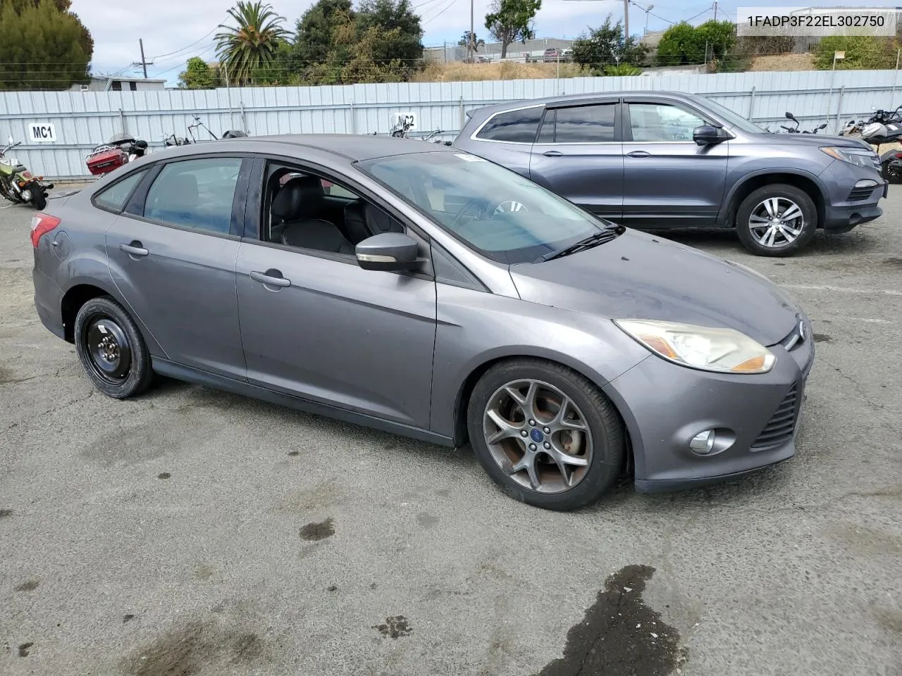 2014 Ford Focus Se VIN: 1FADP3F22EL302750 Lot: 70860294