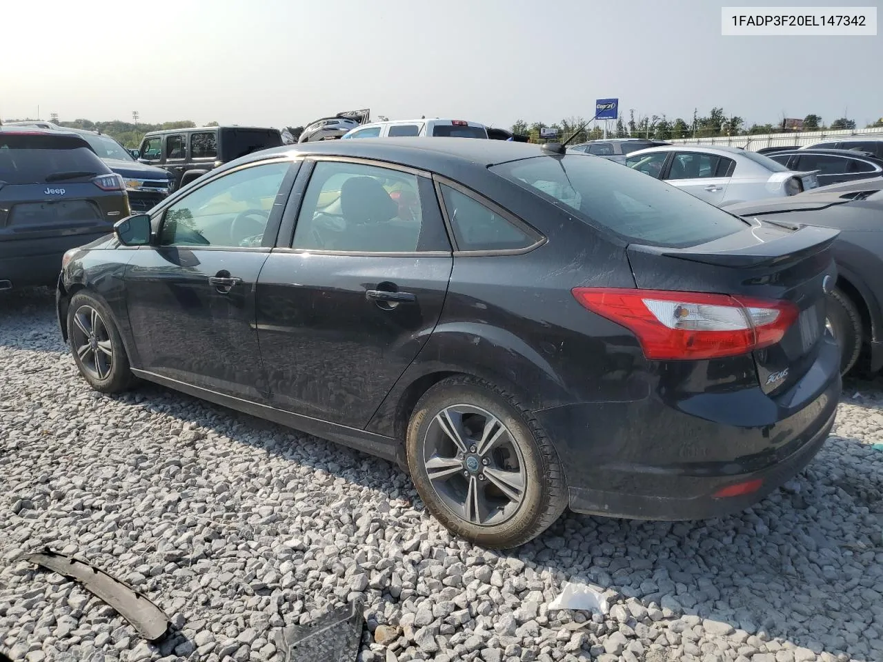 2014 Ford Focus Se VIN: 1FADP3F20EL147342 Lot: 70862604