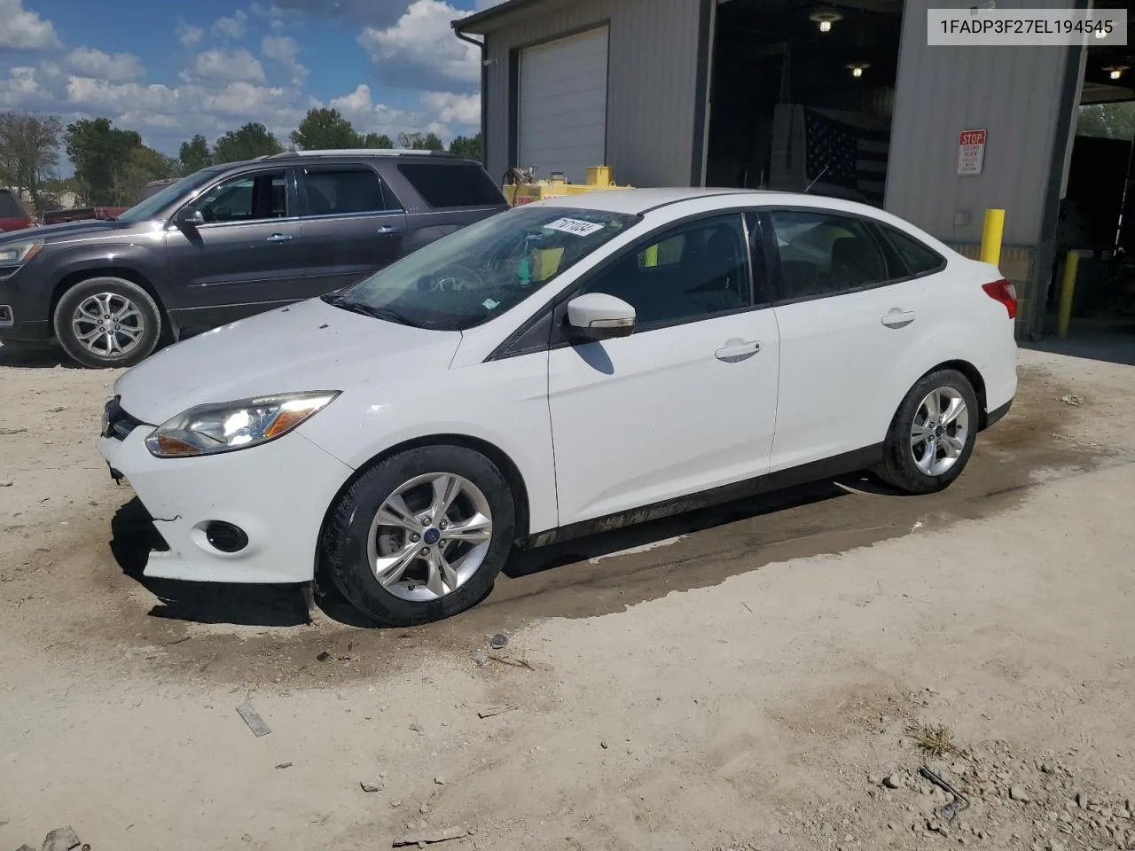 2014 Ford Focus Se VIN: 1FADP3F27EL194545 Lot: 71011034