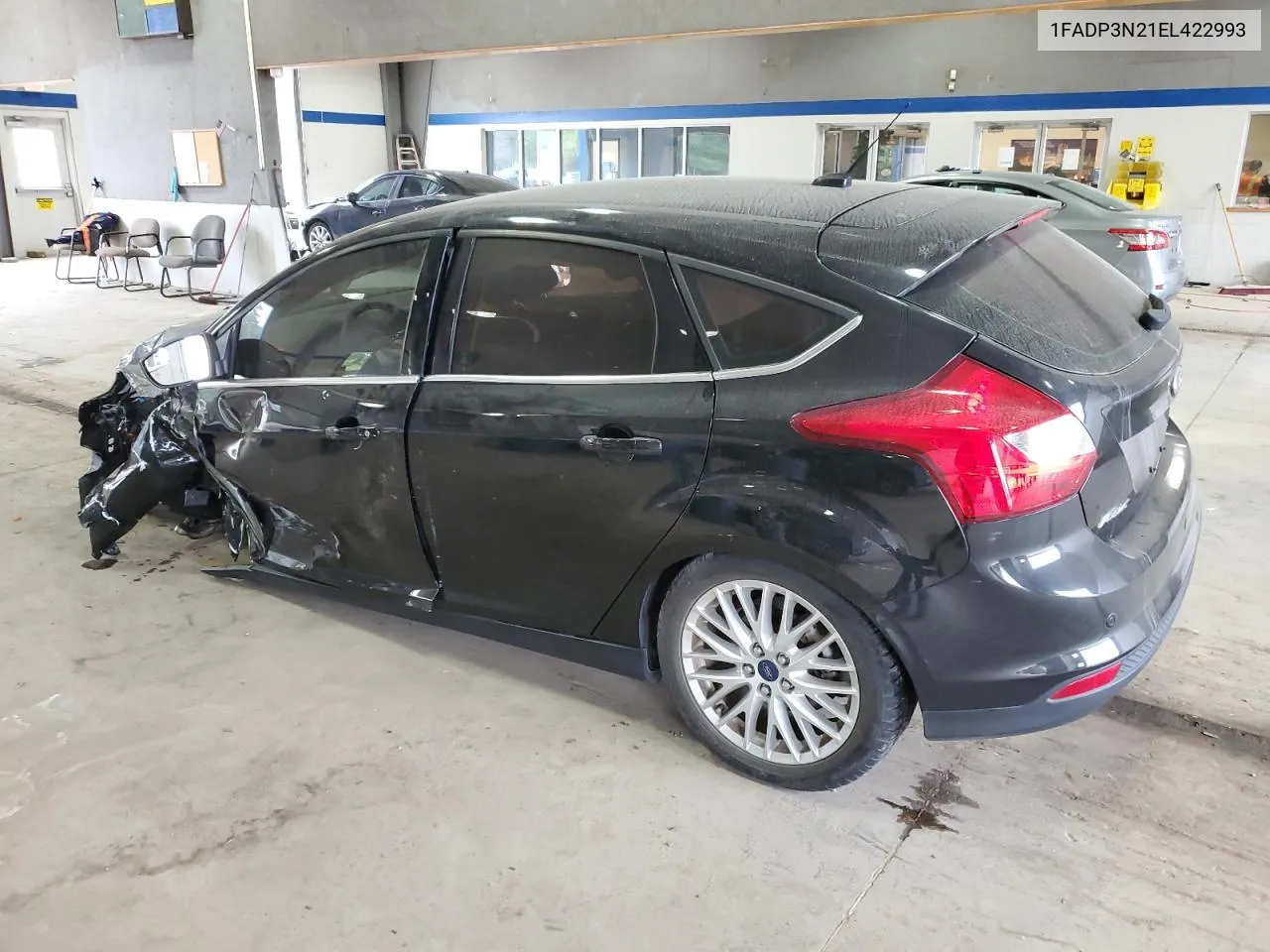 2014 Ford Focus Titanium VIN: 1FADP3N21EL422993 Lot: 71662684