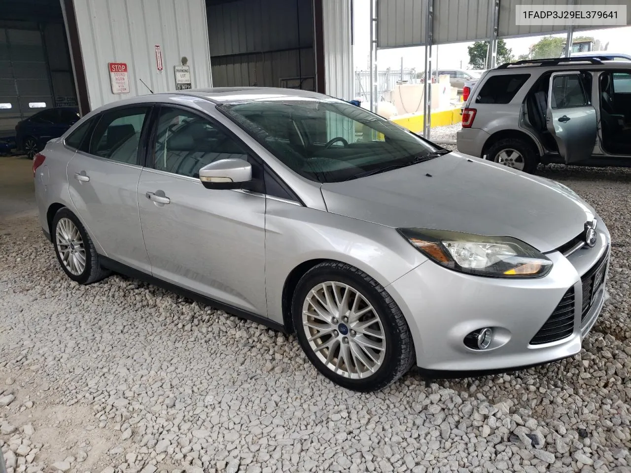 2014 Ford Focus Titanium VIN: 1FADP3J29EL379641 Lot: 72182704