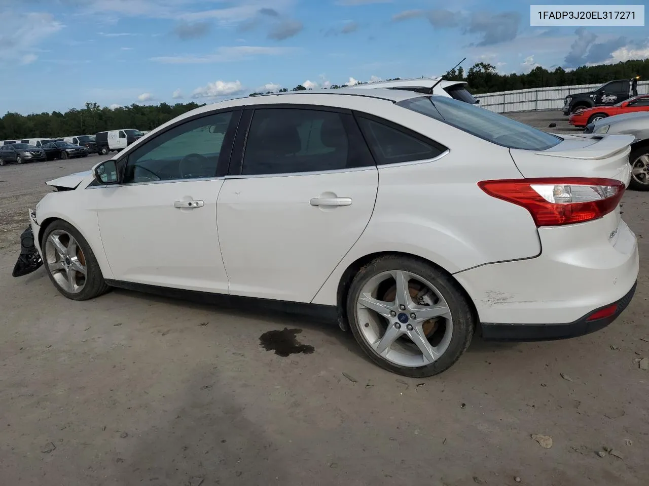 2014 Ford Focus Titanium VIN: 1FADP3J20EL317271 Lot: 72314434