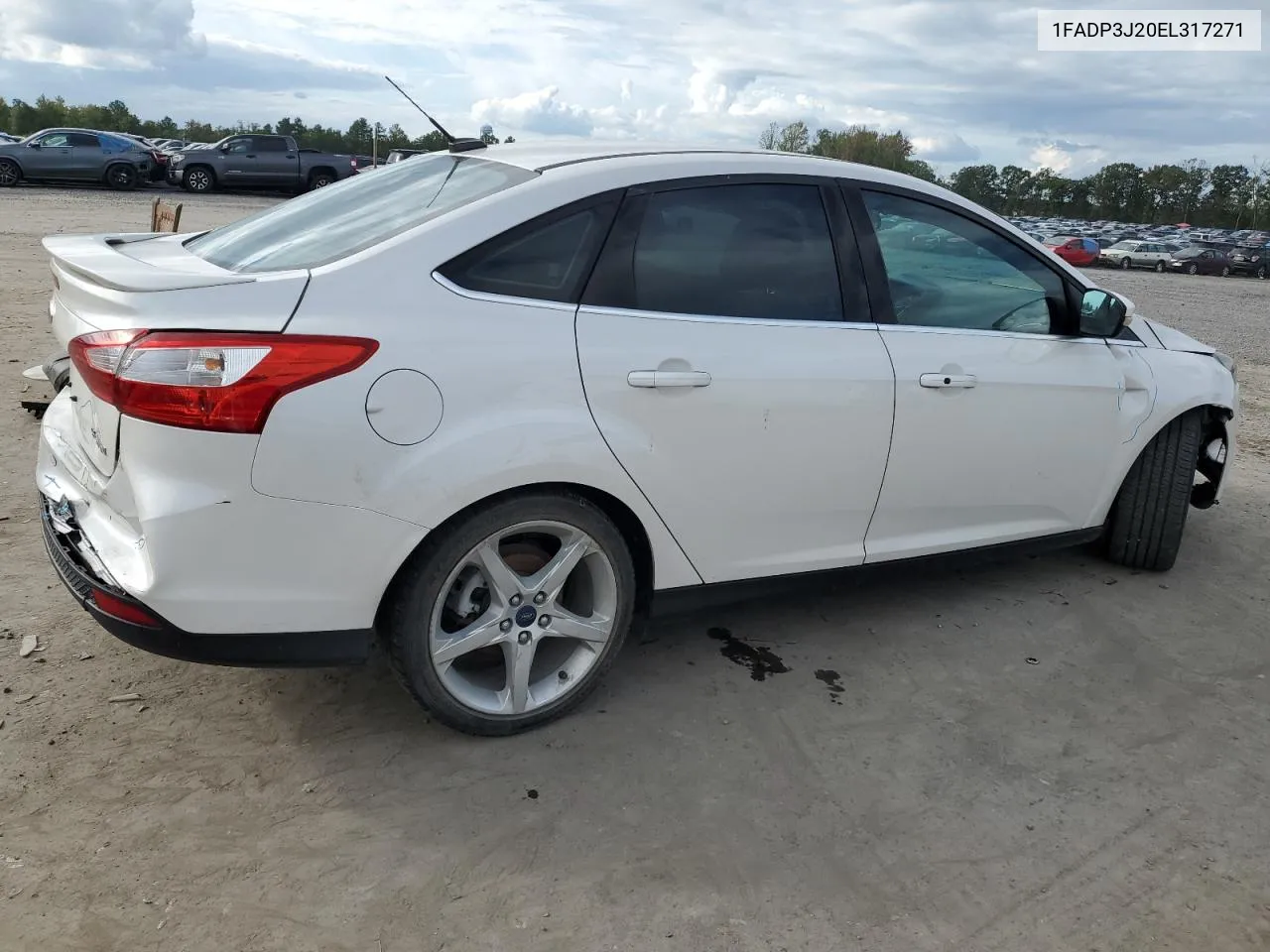 2014 Ford Focus Titanium VIN: 1FADP3J20EL317271 Lot: 72314434