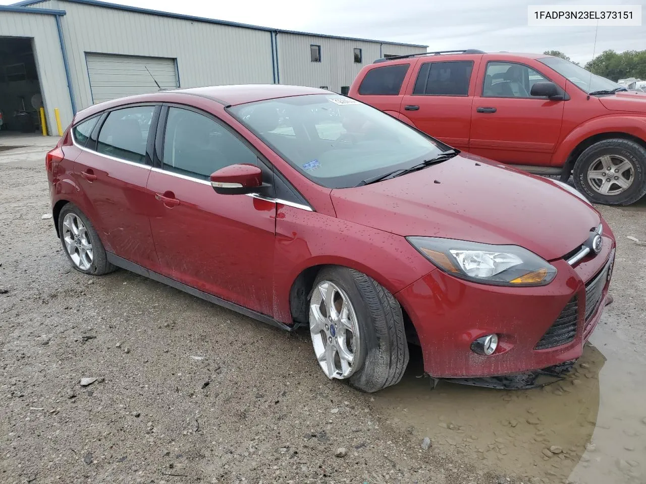 2014 Ford Focus Titanium VIN: 1FADP3N23EL373151 Lot: 72584044