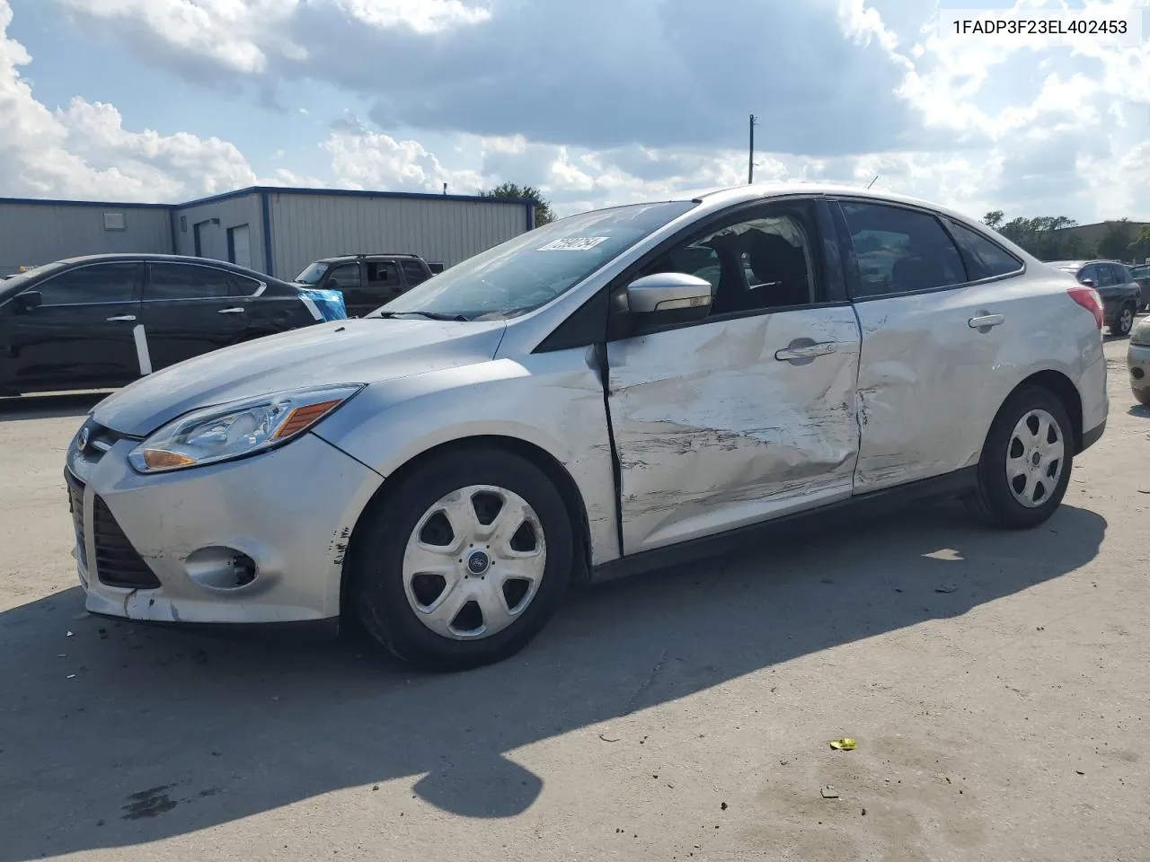 2014 Ford Focus Se VIN: 1FADP3F23EL402453 Lot: 72590754