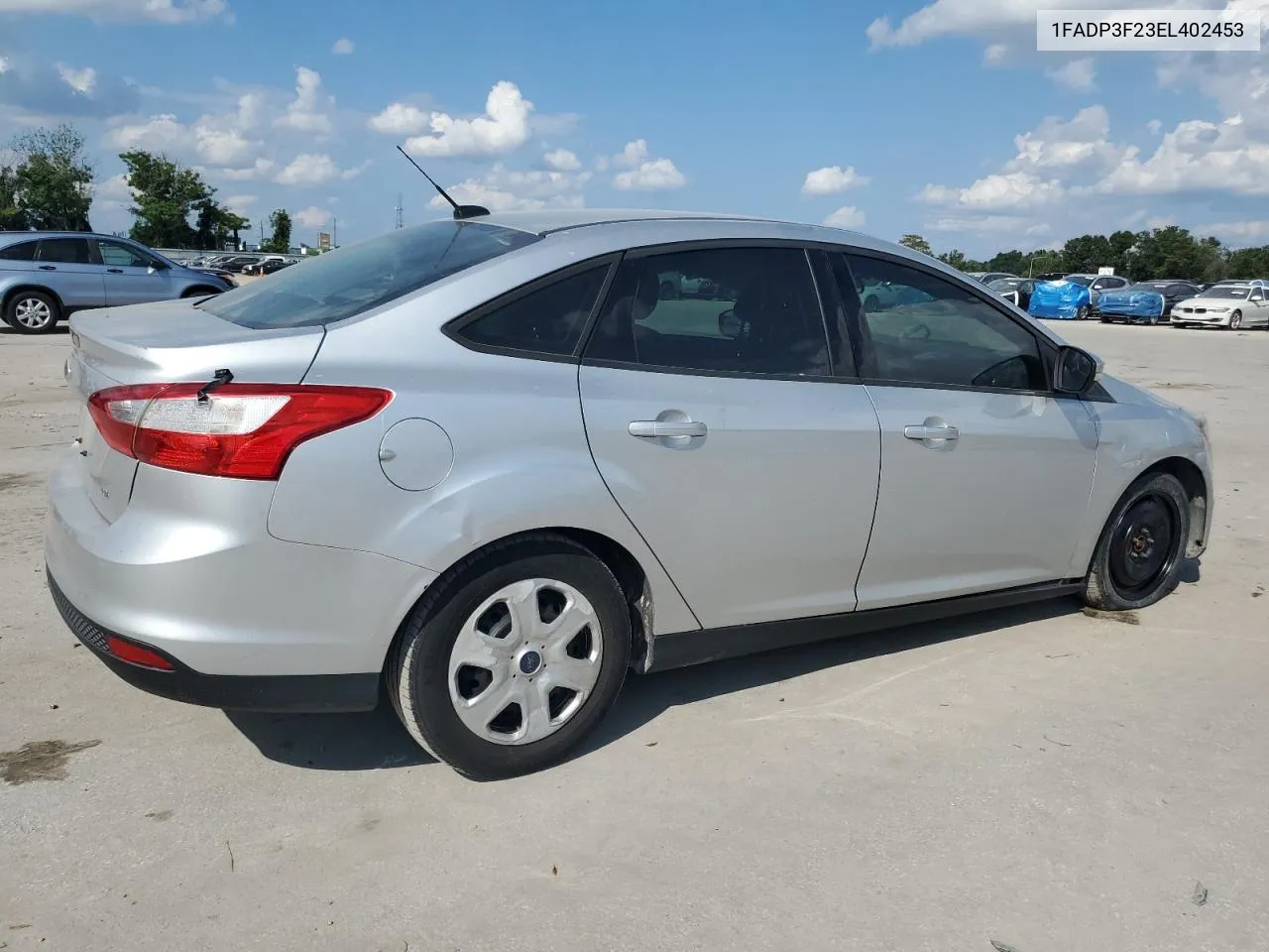 2014 Ford Focus Se VIN: 1FADP3F23EL402453 Lot: 72590754