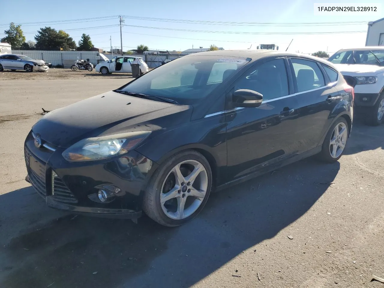 2014 Ford Focus Titanium VIN: 1FADP3N29EL328912 Lot: 72610584