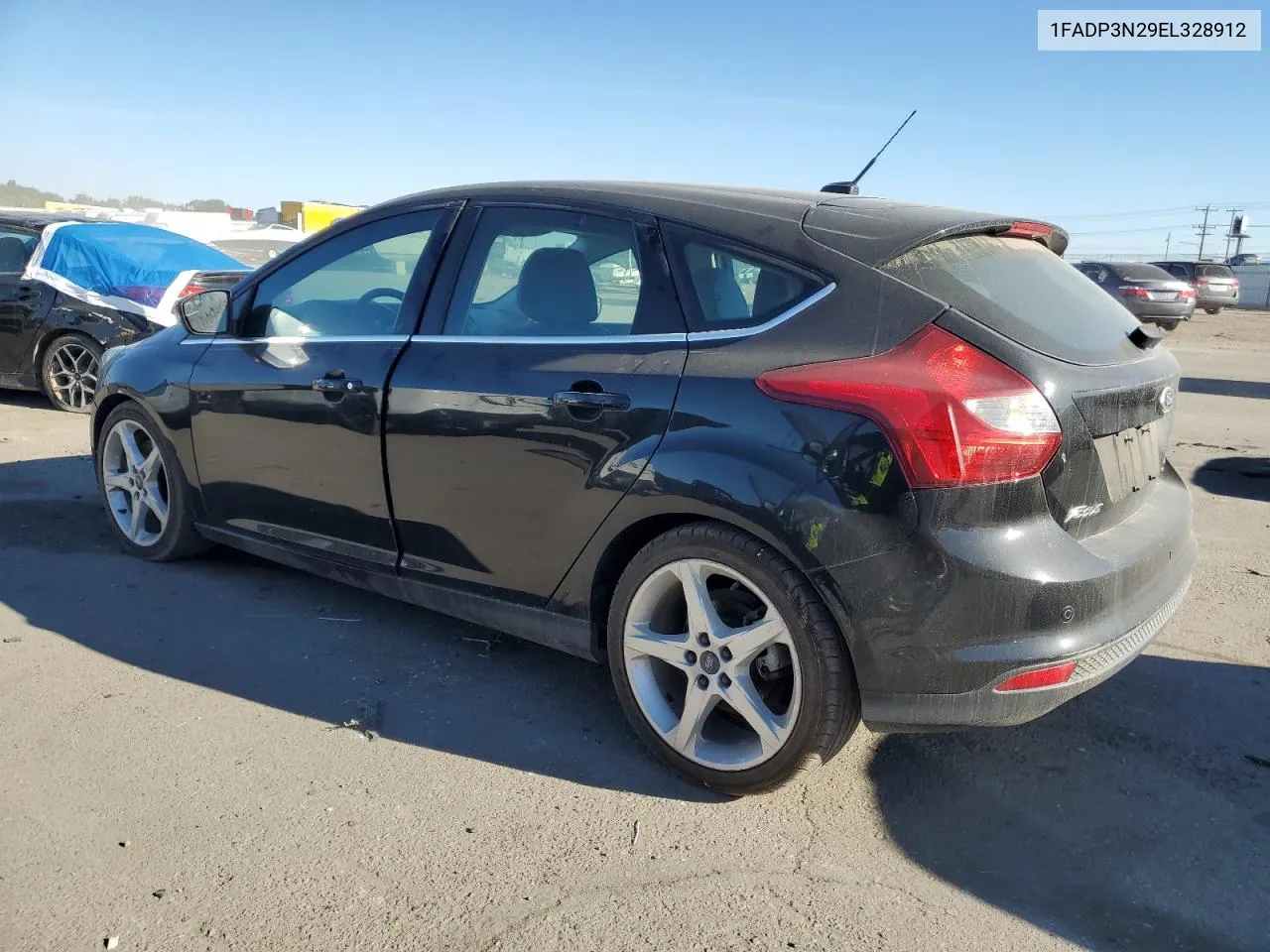 2014 Ford Focus Titanium VIN: 1FADP3N29EL328912 Lot: 72610584