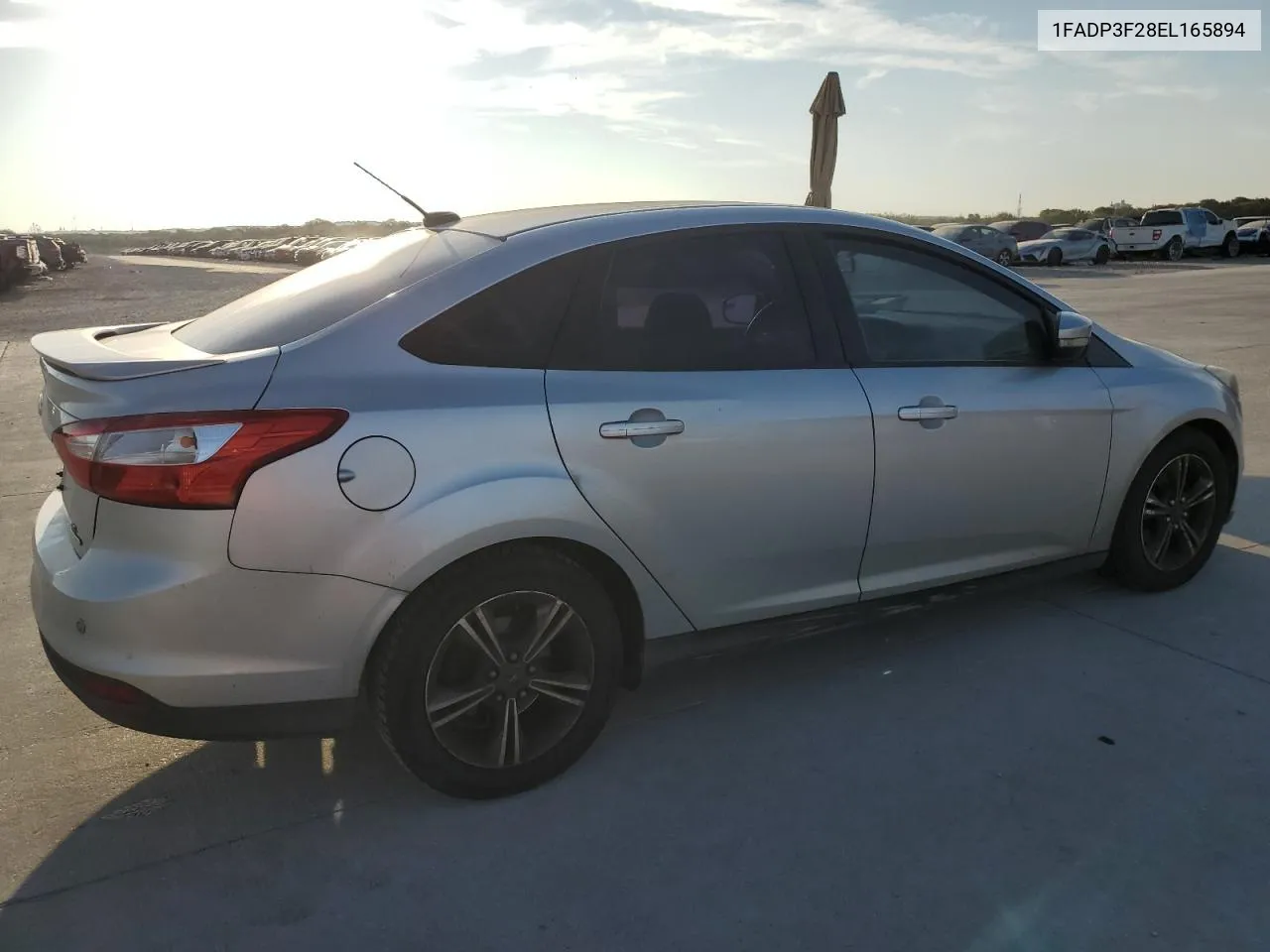 2014 Ford Focus Se VIN: 1FADP3F28EL165894 Lot: 72760684