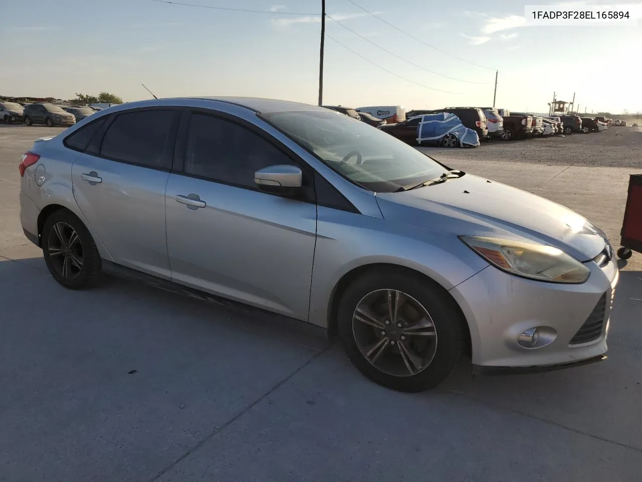 2014 Ford Focus Se VIN: 1FADP3F28EL165894 Lot: 72760684