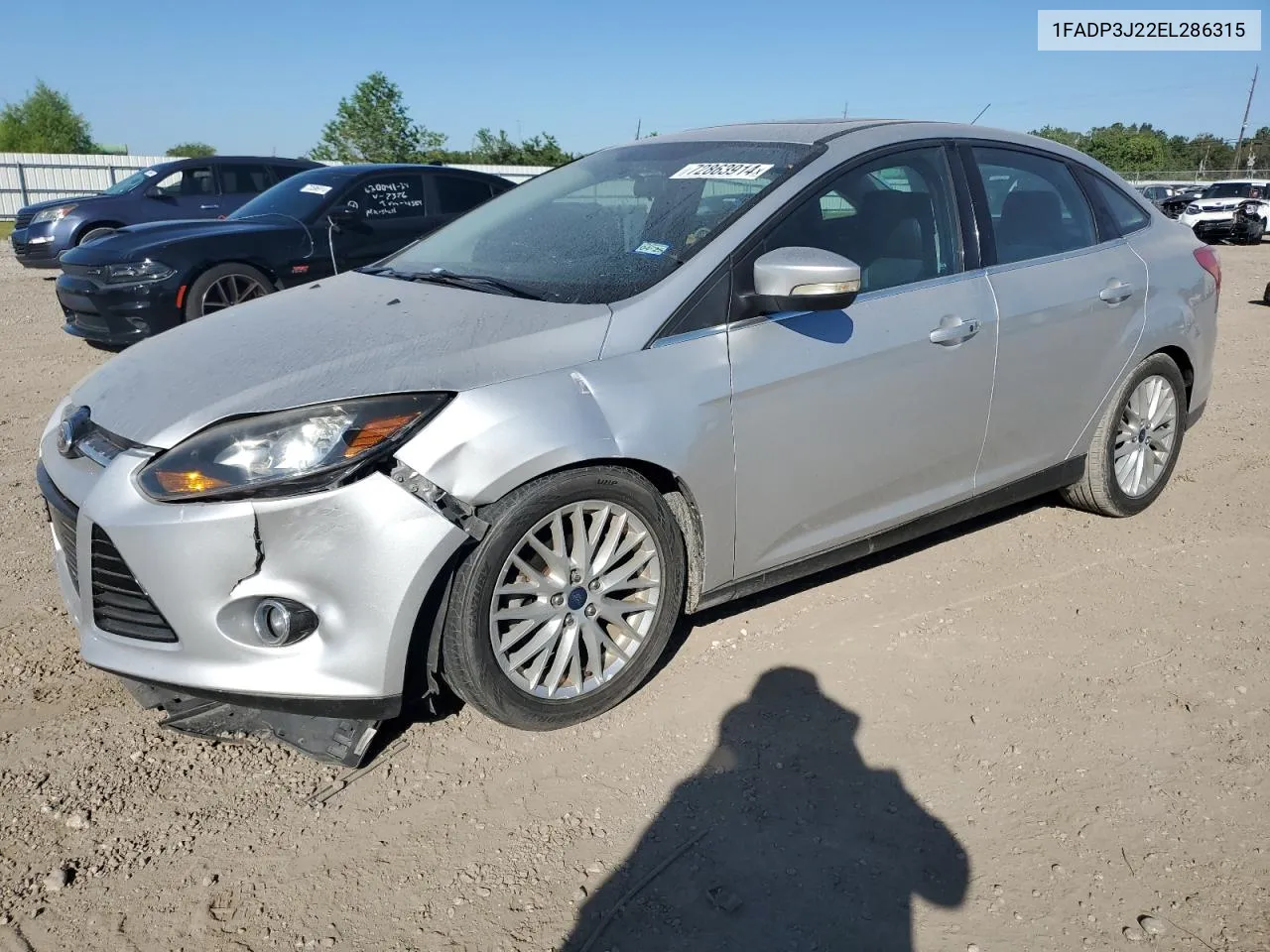 2014 Ford Focus Titanium VIN: 1FADP3J22EL286315 Lot: 72863914