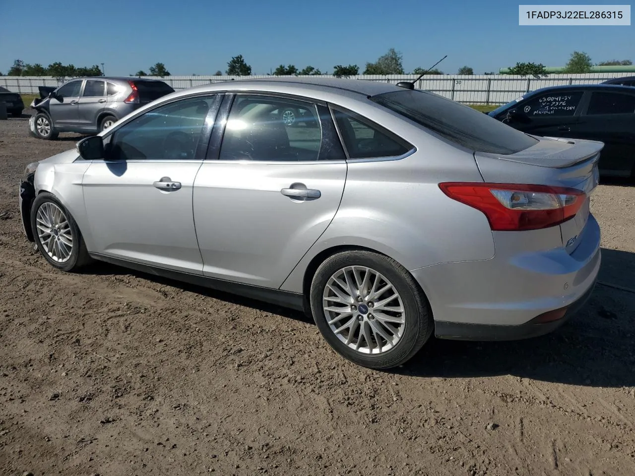 2014 Ford Focus Titanium VIN: 1FADP3J22EL286315 Lot: 72863914