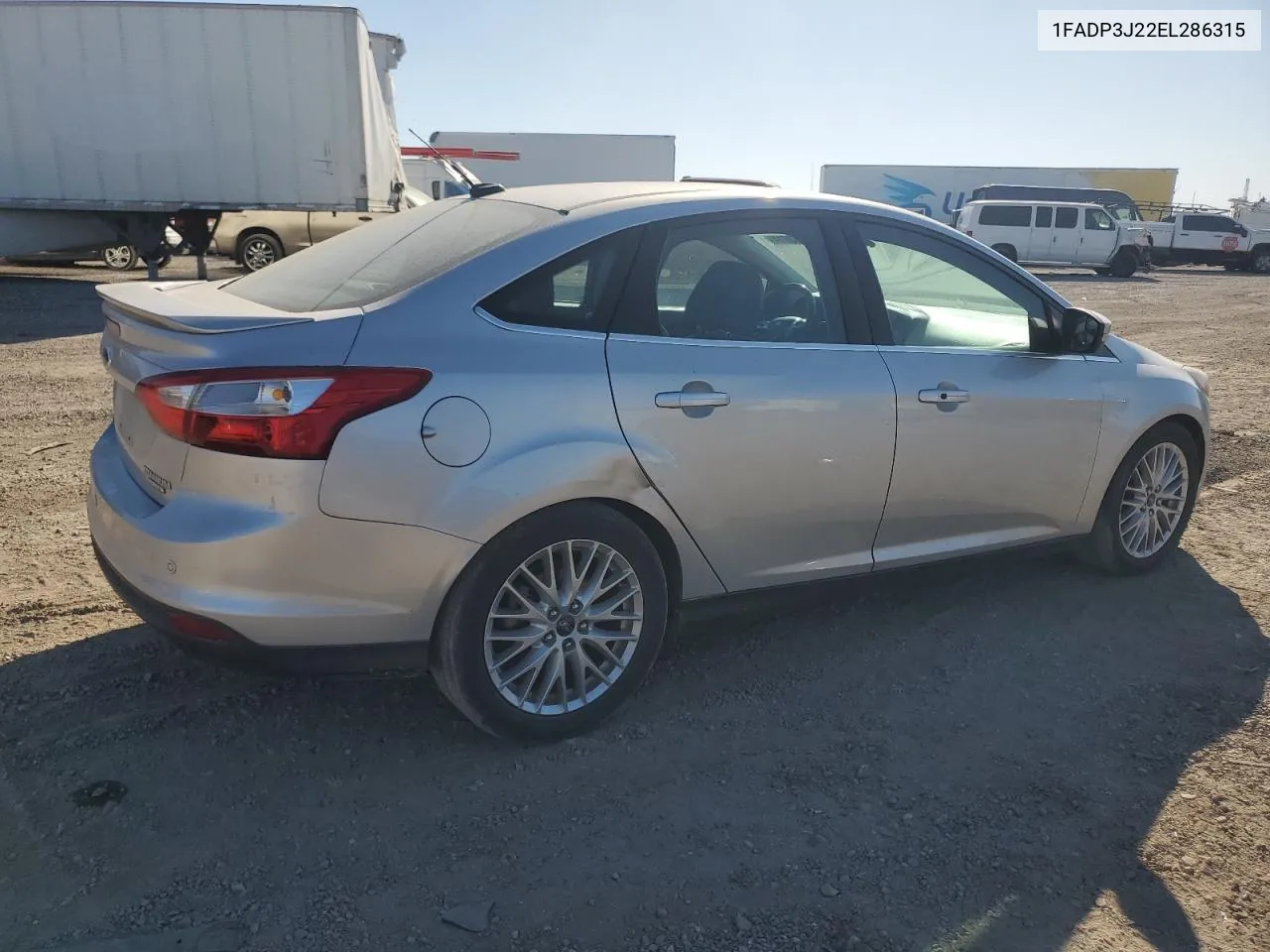 2014 Ford Focus Titanium VIN: 1FADP3J22EL286315 Lot: 72863914