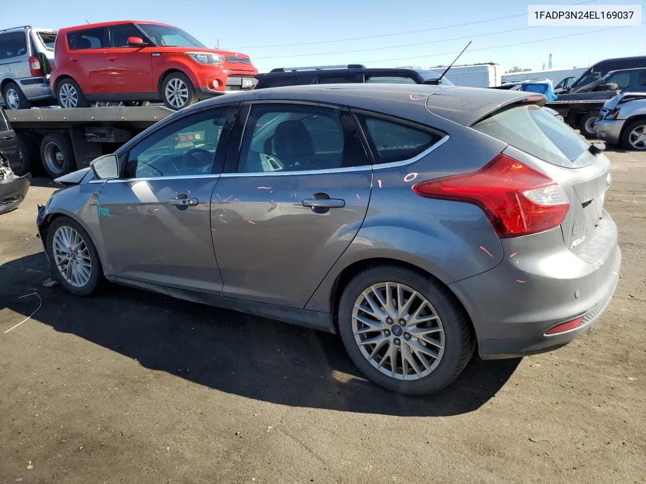 2014 Ford Focus Titanium VIN: 1FADP3N24EL169037 Lot: 73363764