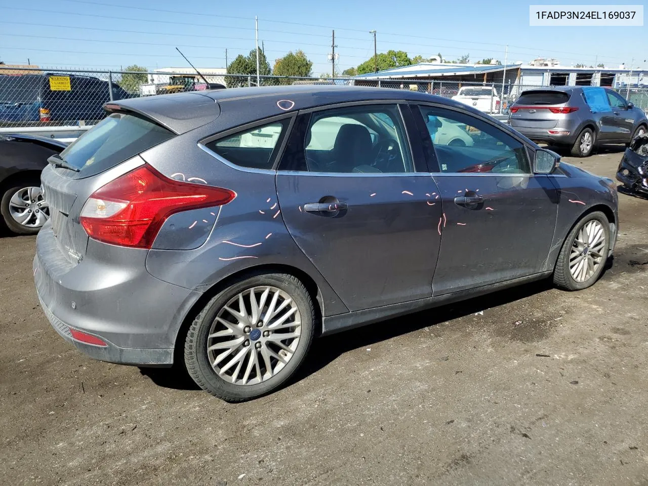 2014 Ford Focus Titanium VIN: 1FADP3N24EL169037 Lot: 73363764