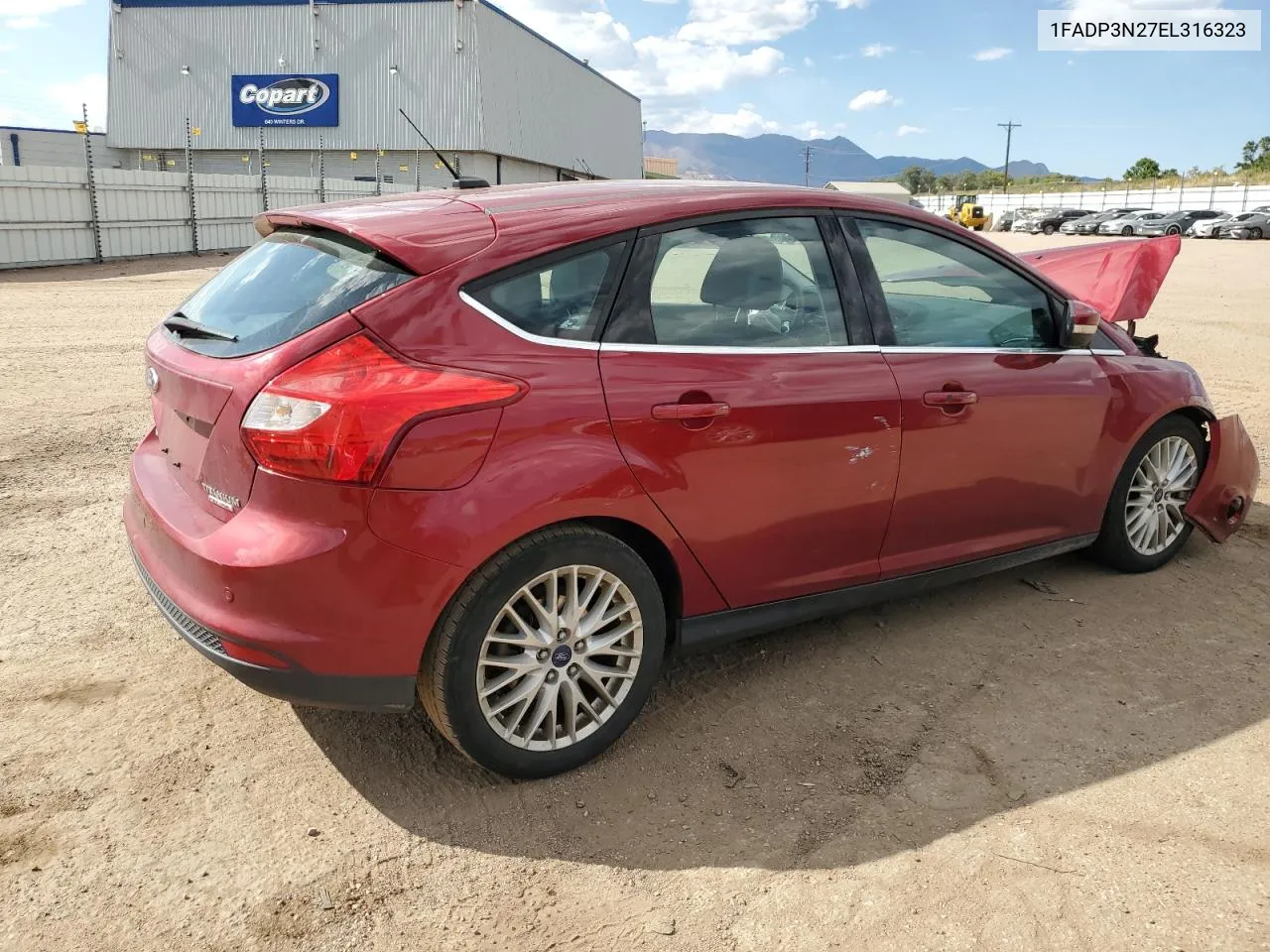 2014 Ford Focus Titanium VIN: 1FADP3N27EL316323 Lot: 73565264