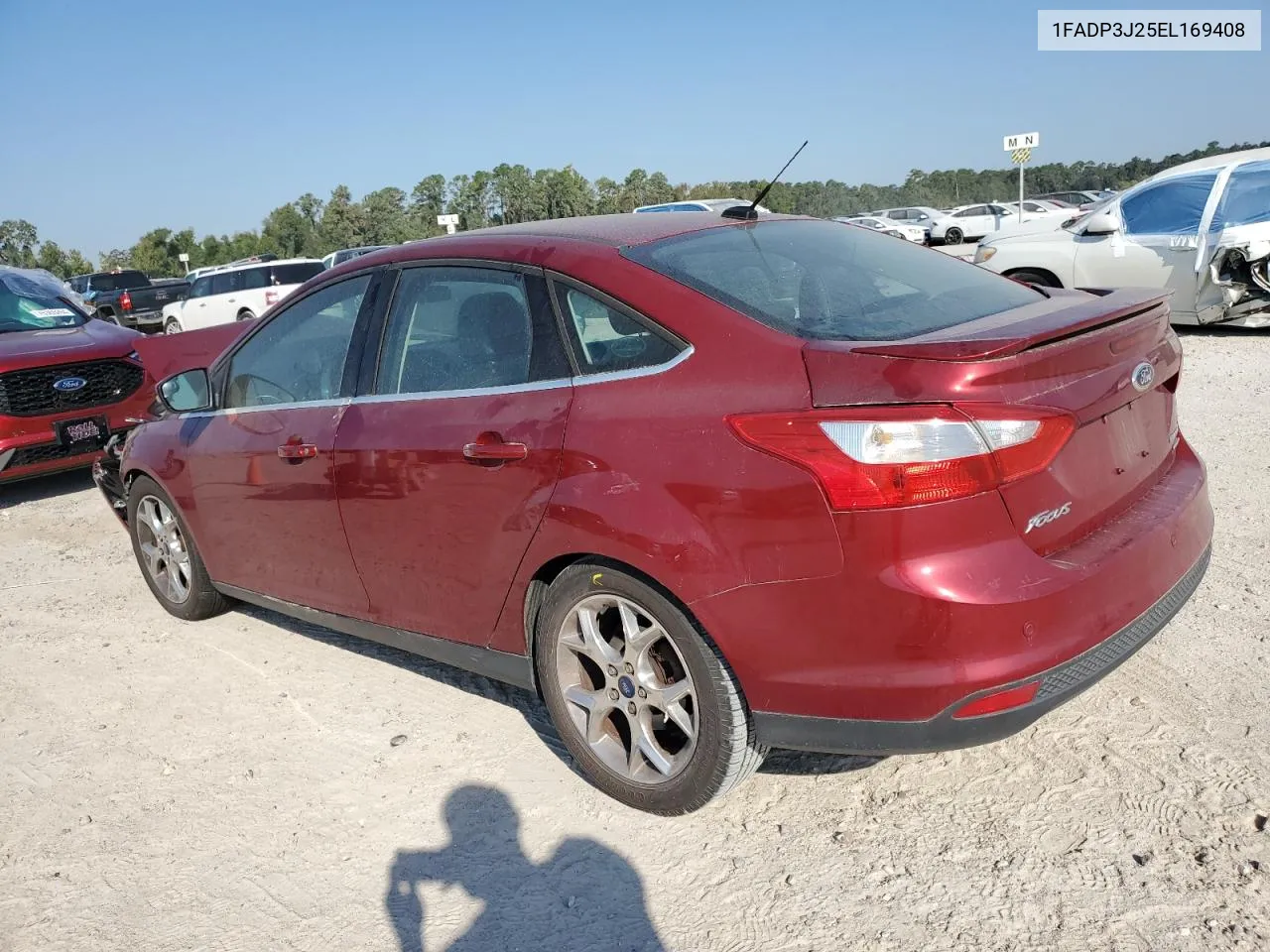 2014 Ford Focus Titanium VIN: 1FADP3J25EL169408 Lot: 73581114